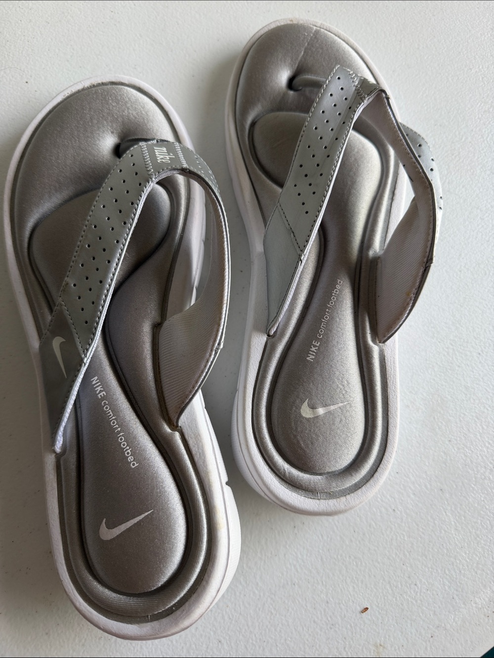 Nike Women's Metallic Silver Foam Flip Flop Sandals
